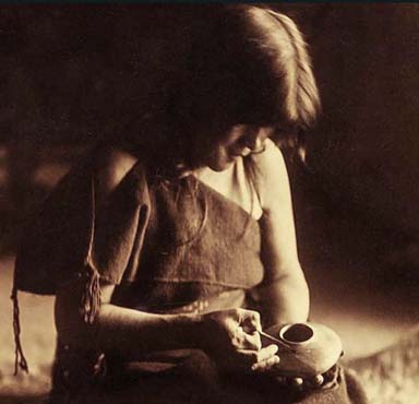 "The Potter" - photographed by Edward Curtis, 1906