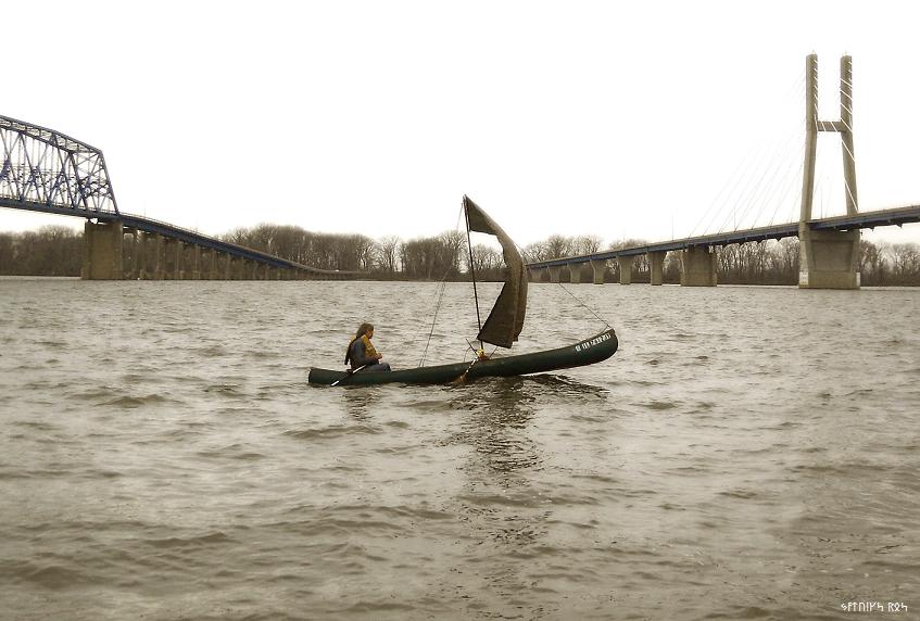 Sailing a sail-canoe UP the Mississippi River by Quincy IL, on Thanksgiving day. 