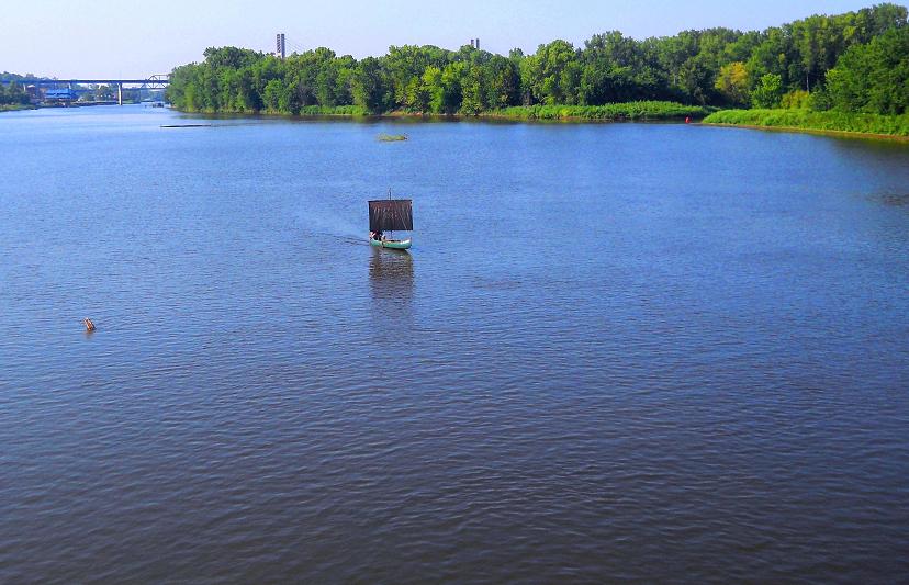 The Fun Part - Sailing a sail-canoe UP the Mississippi River.